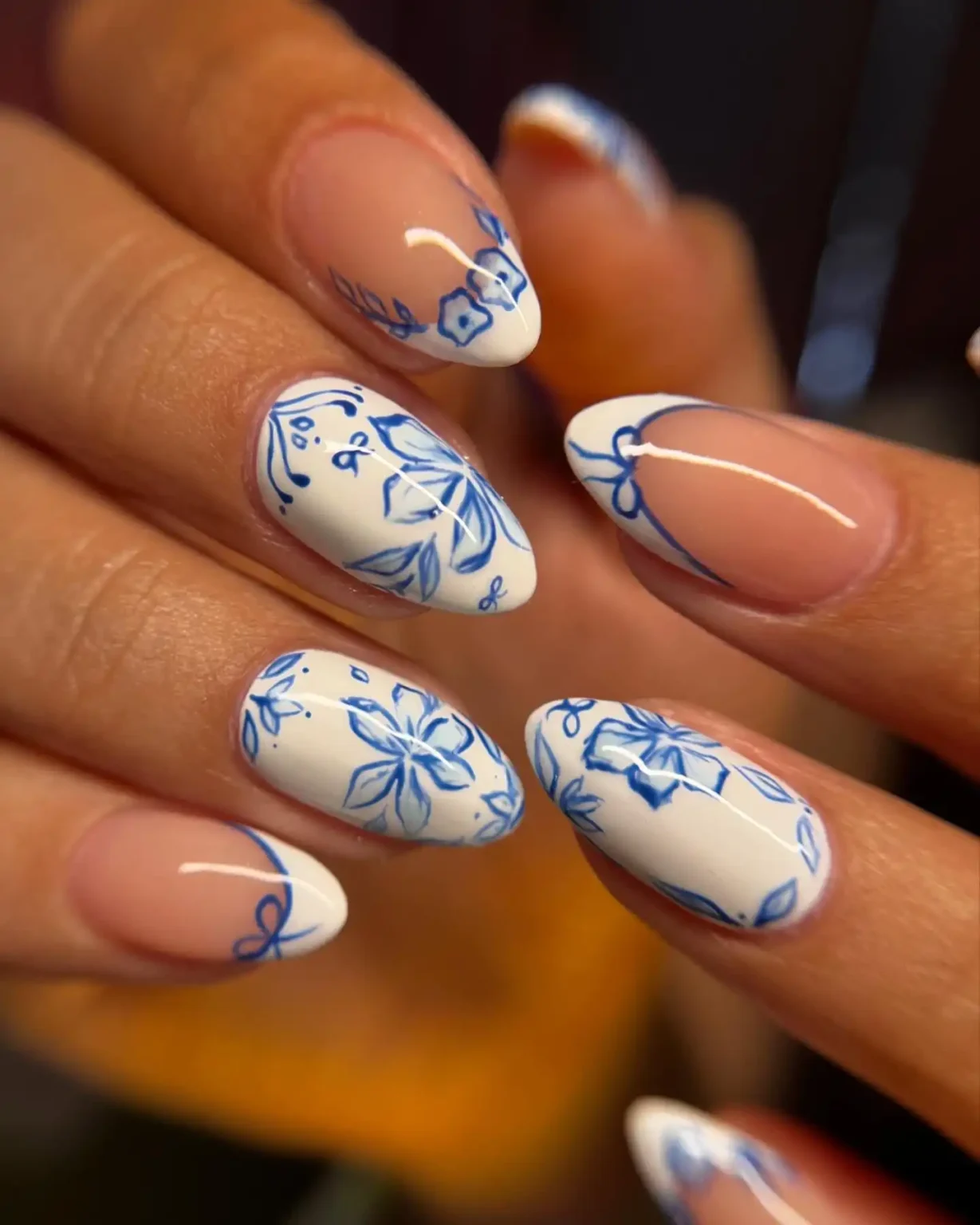 White and nude press on nails with blue floral porcelain inspired nail art designWhite and nude press on nails with blue floral porcelain inspired nail art design