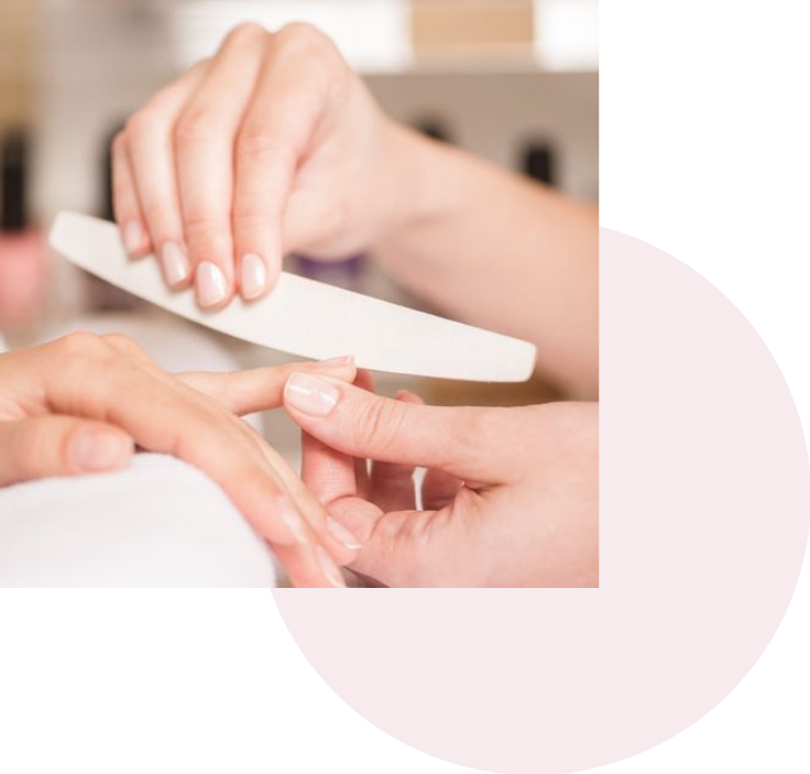 Nail preparation process showing natural nails being filed before applying press on nails